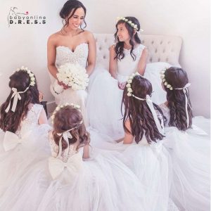 Abito da ballo senza maniche con scollo a V, con fiocco in pizzo e tulle applicato a fiori per bambine